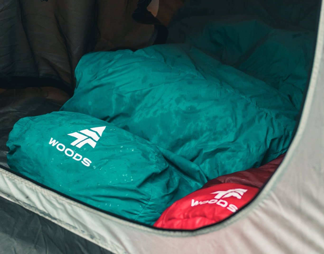 Green and Red Wet Textile in a Tent sleeping bag prepper list