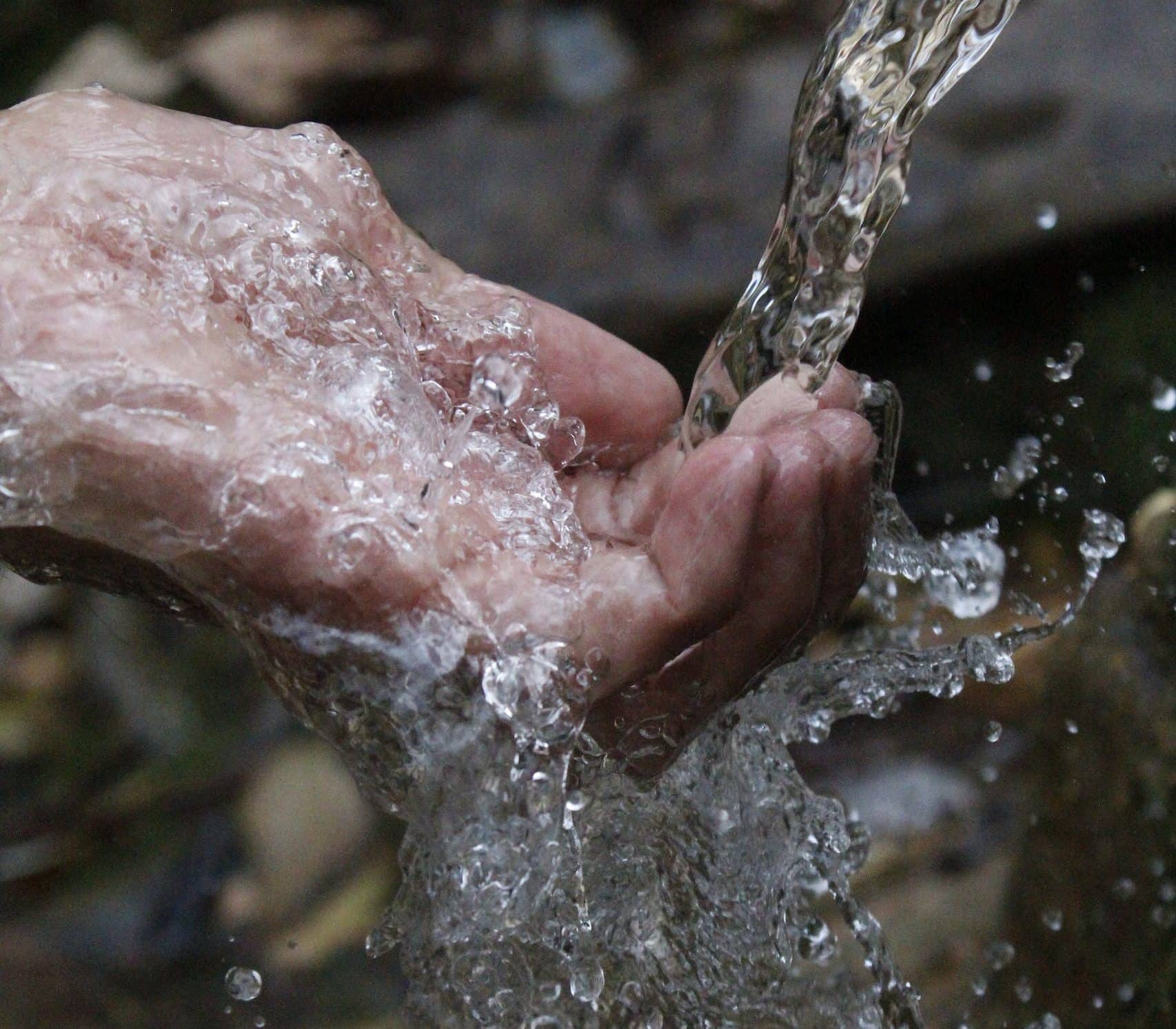 Person Cleaning Hands under Water how to start prepping