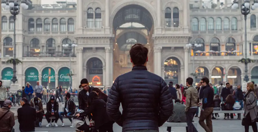 man standing in a crowded area
